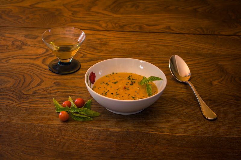 Roasted tomato bisque soup with basil oil