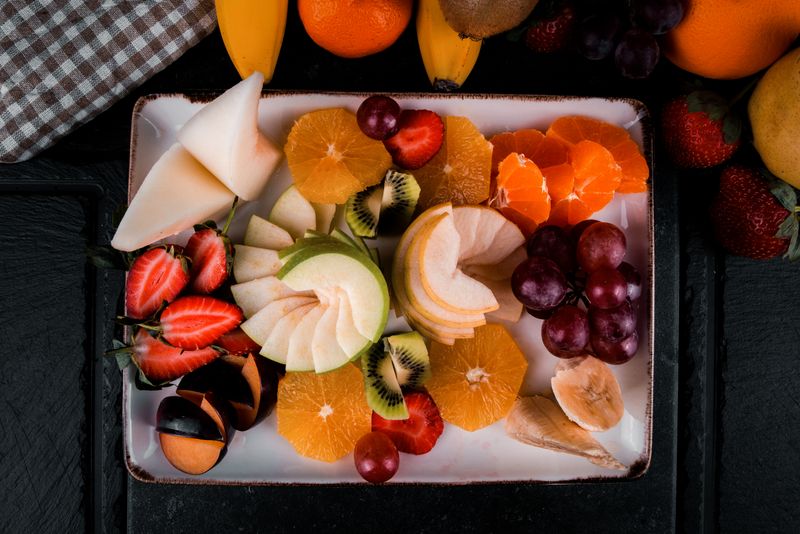 Sweet dessert platter with seasonal fruits